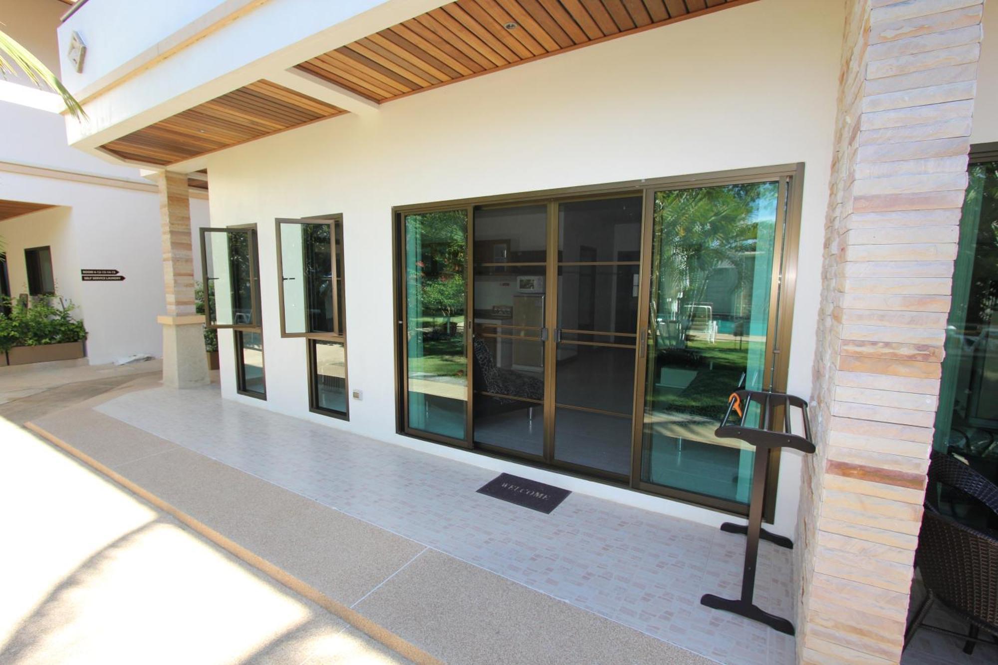 Babylon Pool Villas Nai Harn Eksteriør bilde